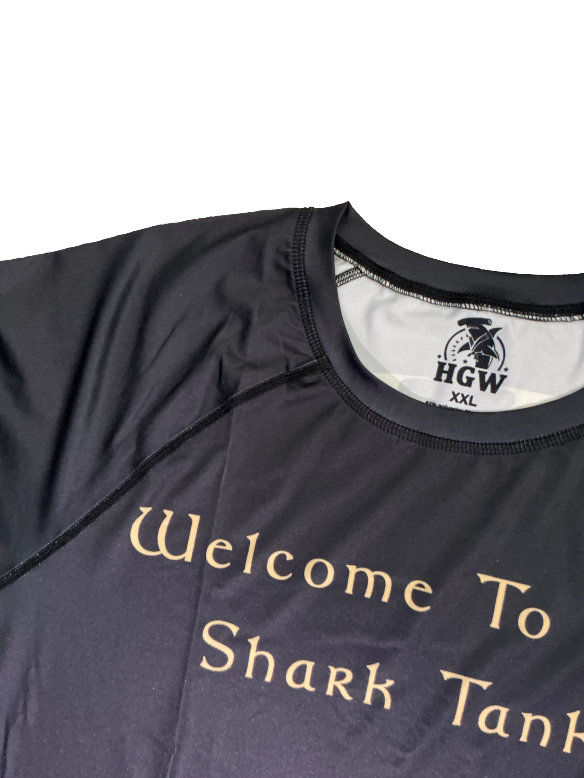 Black and gold "Welcome To The Shark Tank" tribal rash guard for grappling Hammerhead Grappling Wear