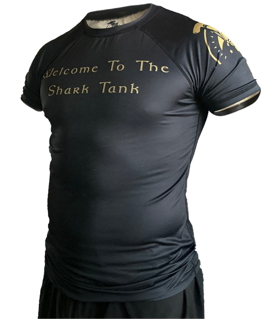 Black and gold "Welcome To The Shark Tank" tribal rash guard for grappling Hammerhead Grappling Wear